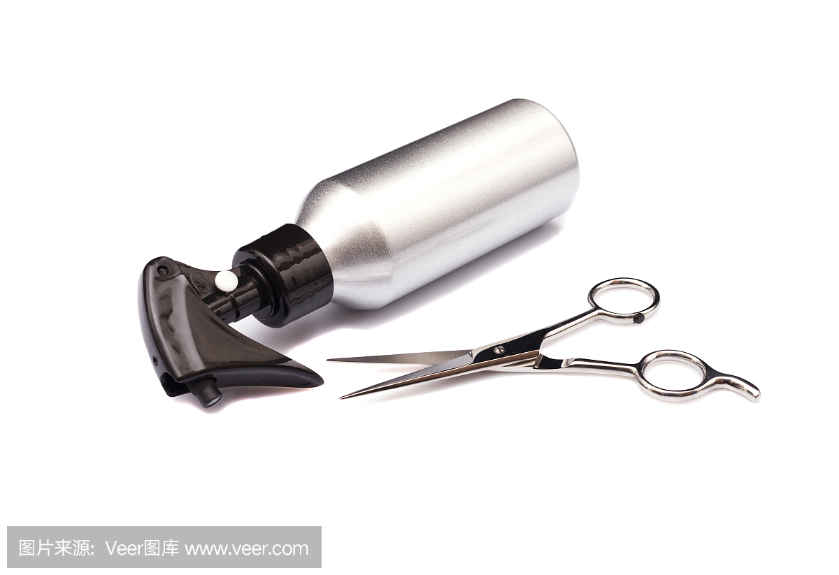 金屬發(fā)型師噴瓶和專業(yè)不銹鋼剪刀。